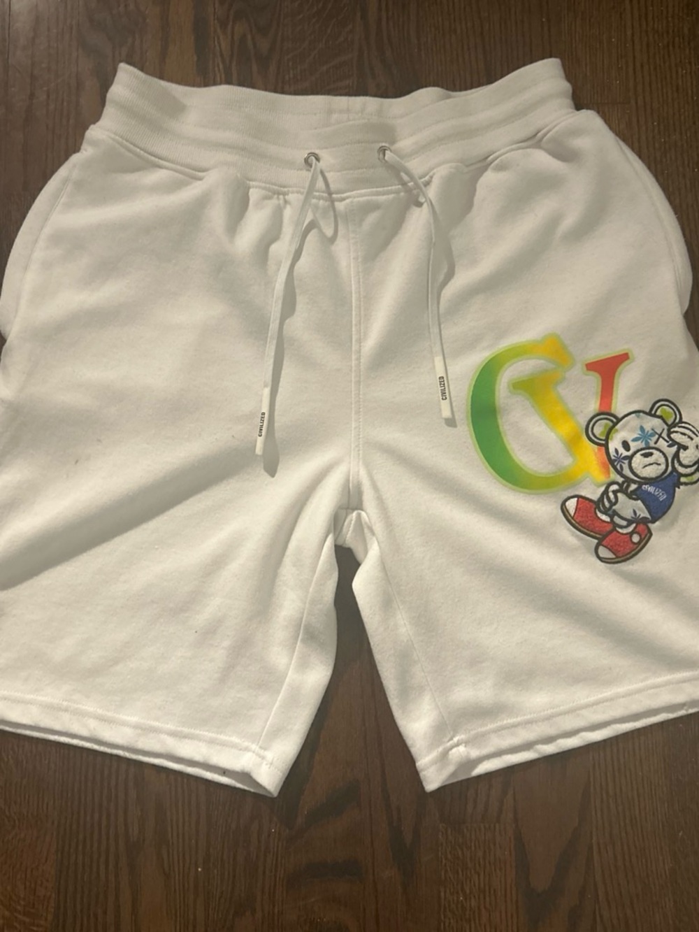 White Men's Athletic Drawstring Shorts with Colorful GV Bear Graphic